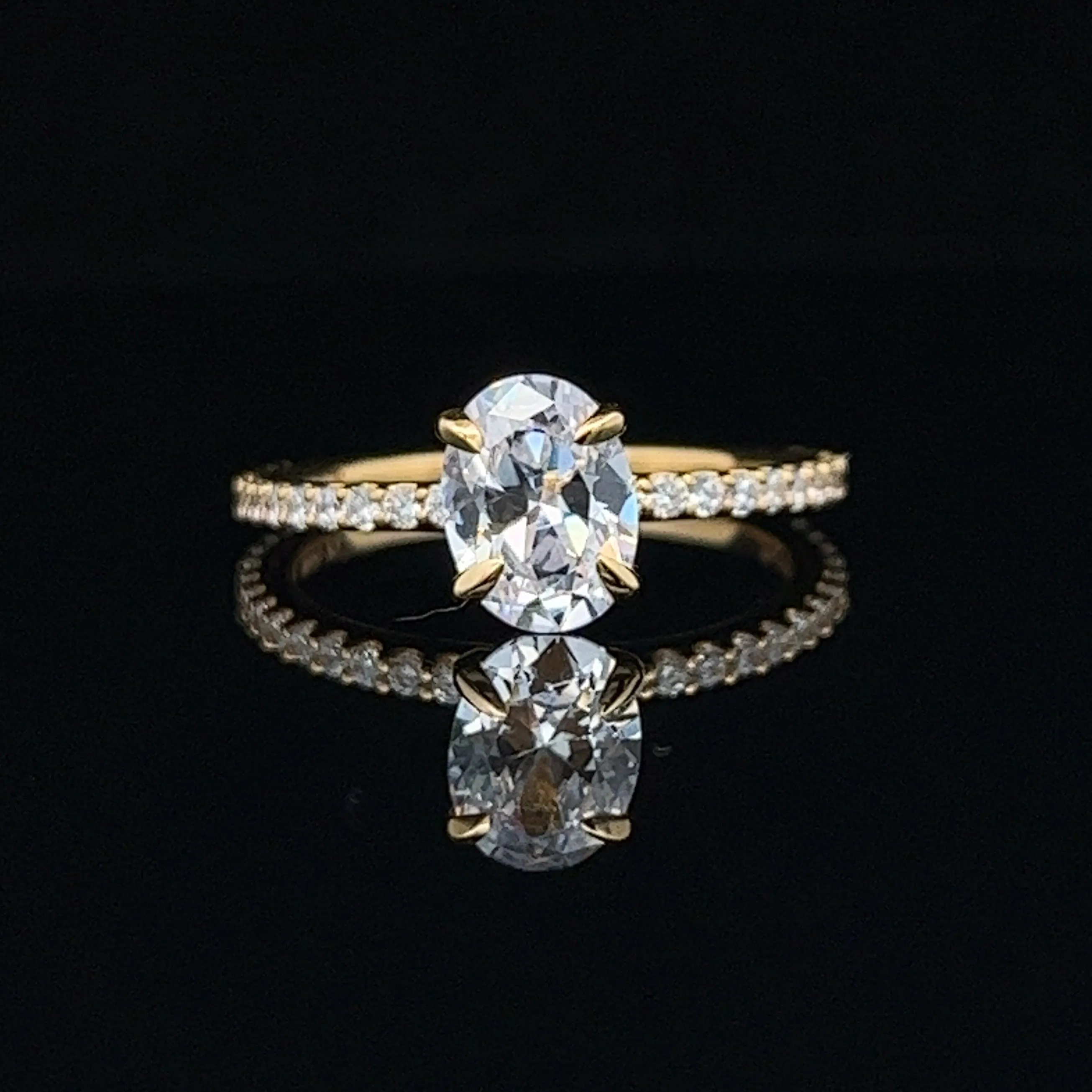 1 1/2 ctw oval diamond engagement ring with pave accents & hidden collar