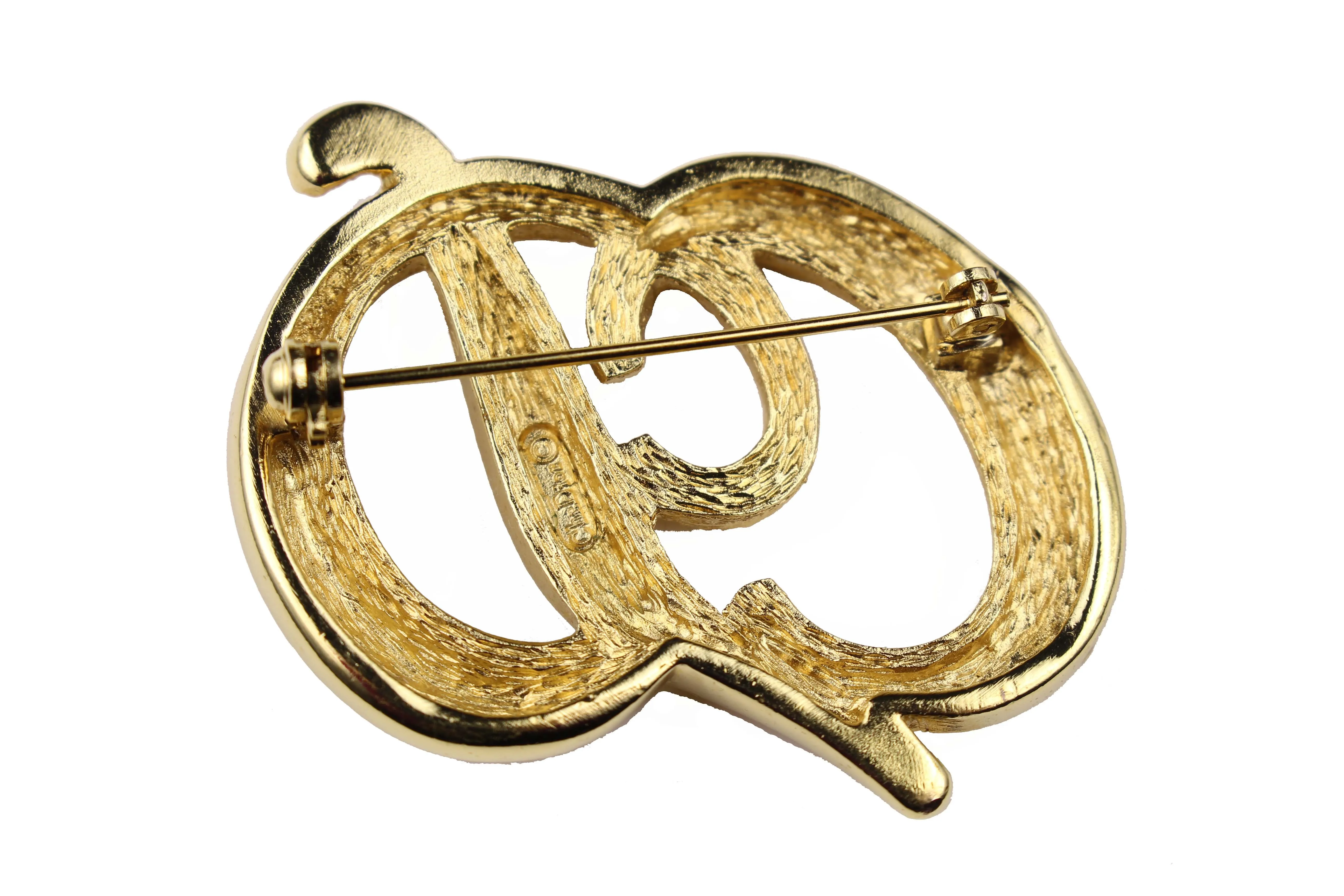 CHRISTIAN DIOR Logo embossed brooch