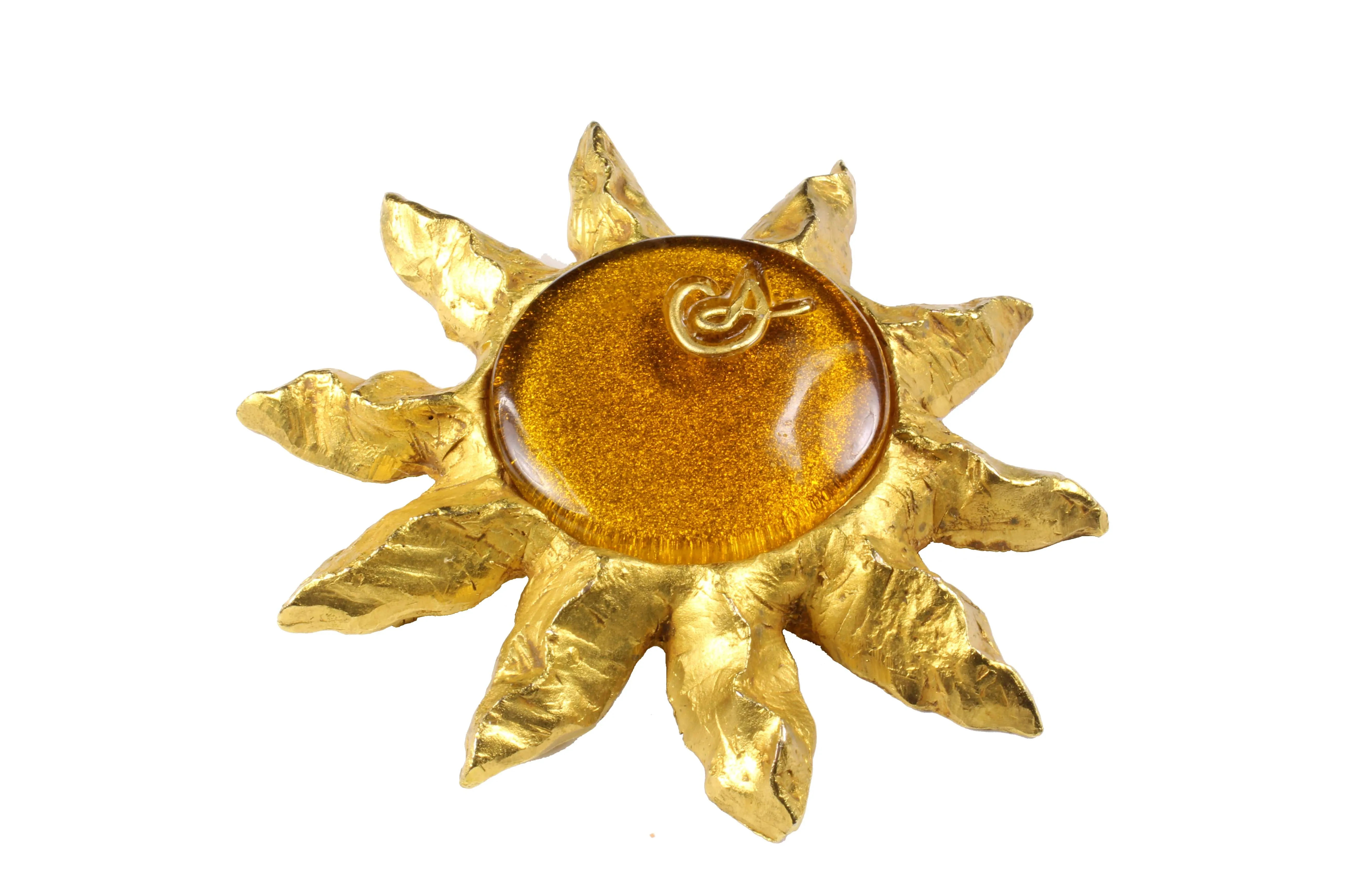 CHRISTIAN LACROIX large amber resin sun brooch