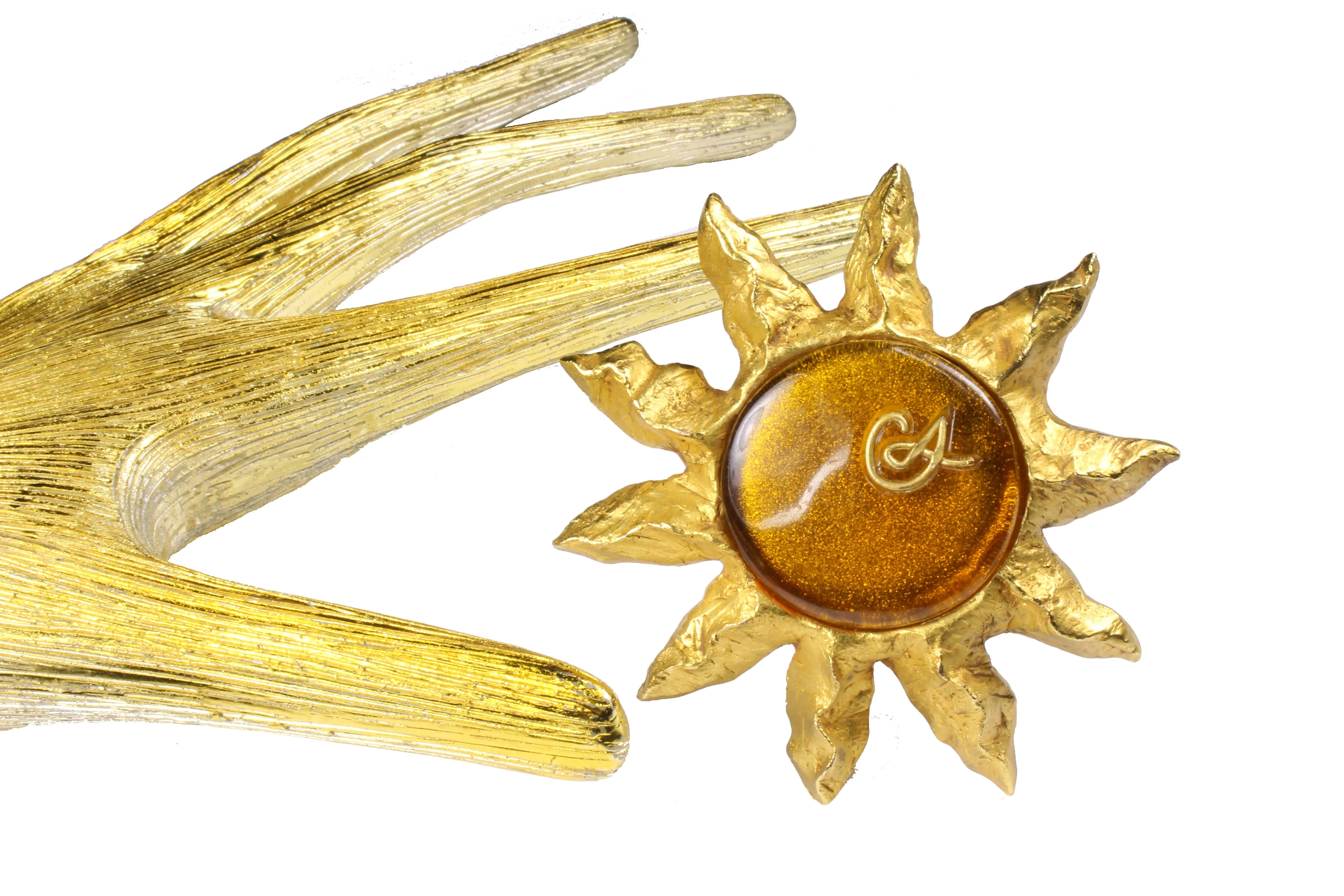 CHRISTIAN LACROIX large amber resin sun brooch