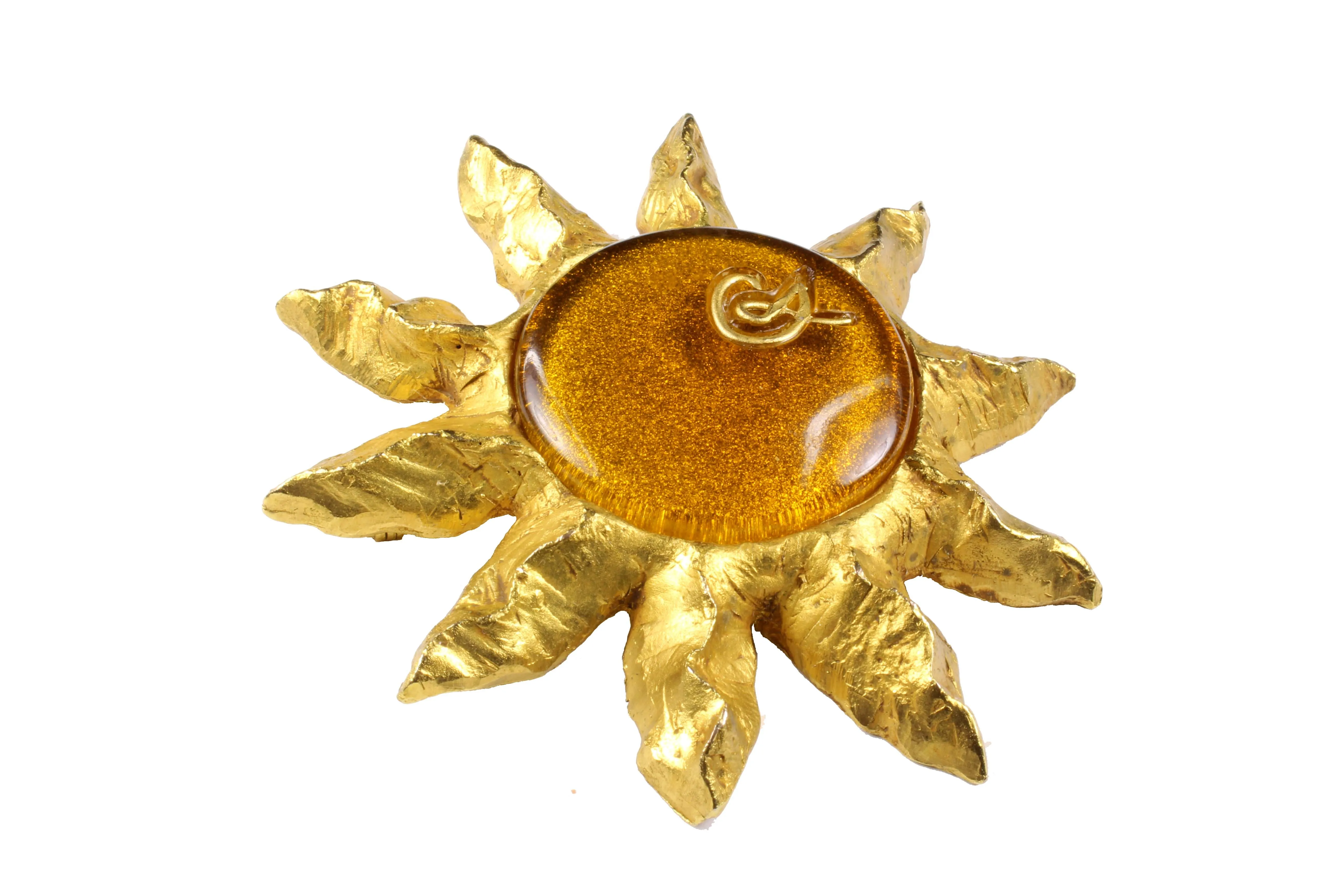 CHRISTIAN LACROIX large amber resin sun brooch