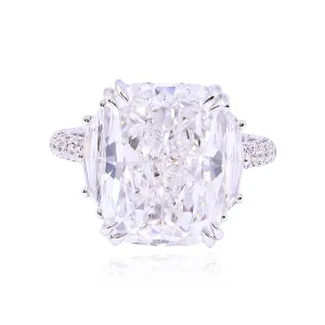 PLATINUM CUSHION-CUT DIAMOND THREE-STONE ENGAGEMENT RING WITH CADILLAC-CUT SIDE DIAMONDS